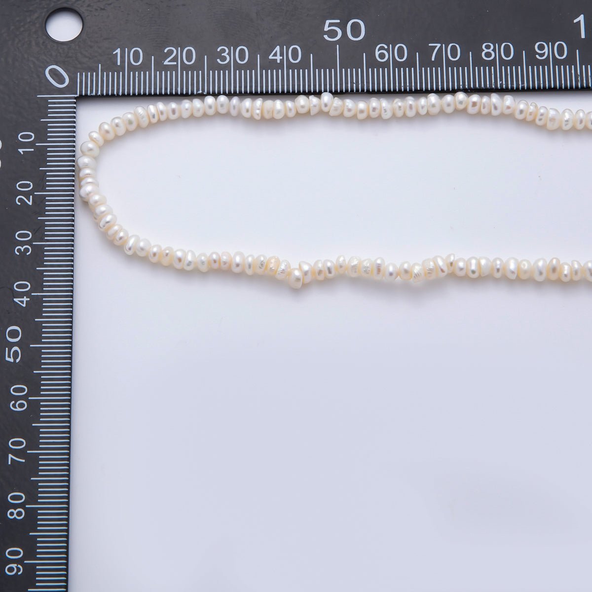18K Gold Filled 4mm Dainty Rice Seed Freshwater Pearl Necklace 14.9 Inches long | WA-A3475 - Dressed.