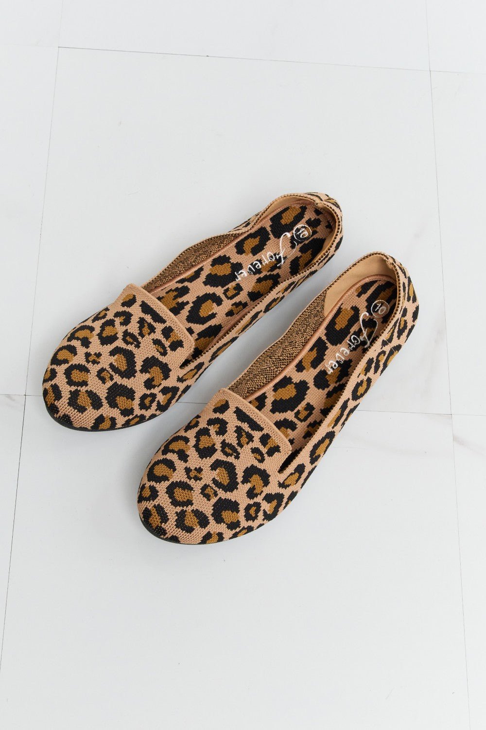Avery Pointed-Toe Leopard Flats - Dressed.
