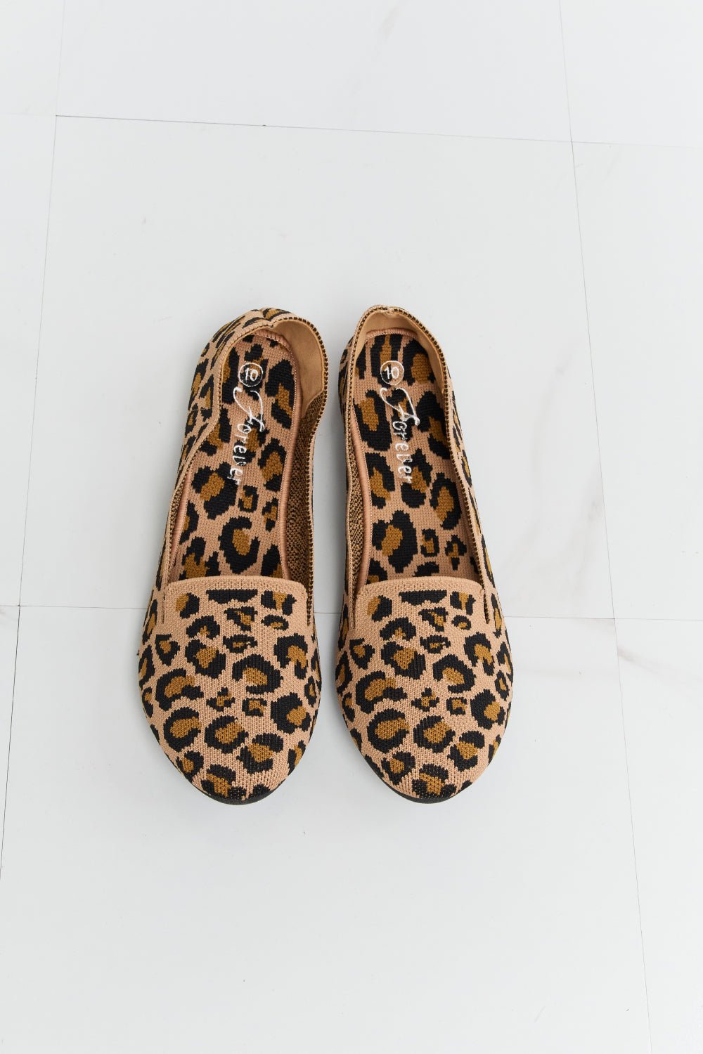 Avery Pointed-Toe Leopard Flats - Dressed.