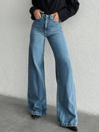 Celia High-Waisted Bootcut Jeans - Dressed.