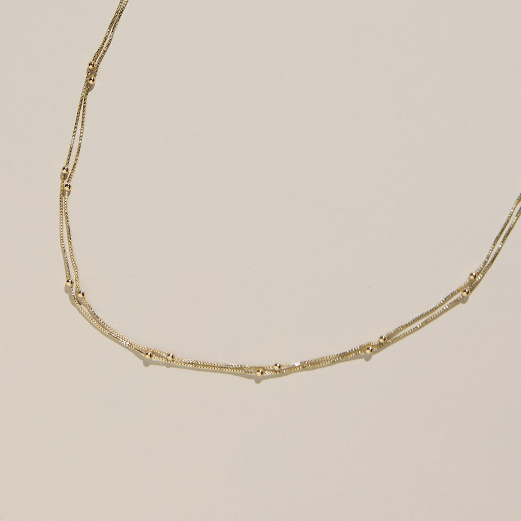 Gold Waterproof Double Layer Saturn Chain Necklace - Dressed.