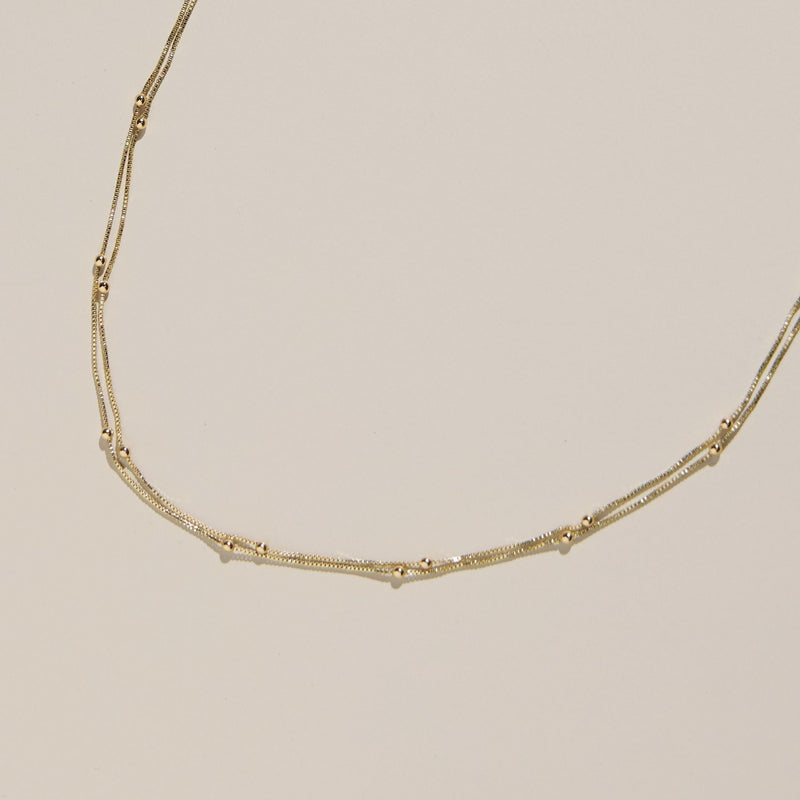 Gold Waterproof Double Layer Saturn Chain Necklace - Dressed.