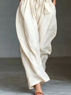 Halter Neck Wide-Leg Jumpsuit with Waist-Tie Detail - Dressed.