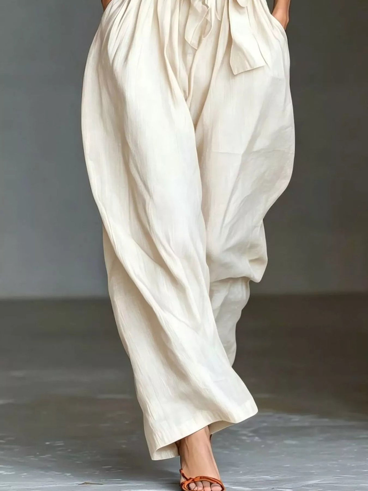 Halter Neck Wide-Leg Jumpsuit with Waist-Tie Detail - Dressed.
