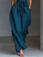 Halter Neck Wide-Leg Jumpsuit with Waist-Tie Detail - Dressed.