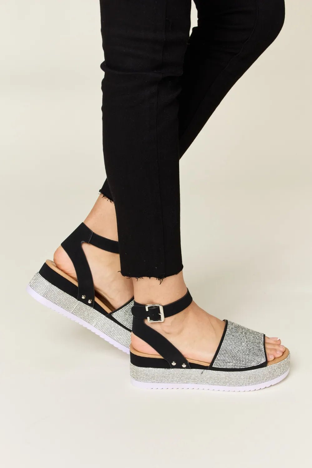 Noelle Rhinestone-Buckle Wedge Sandals — Black - Dressed.